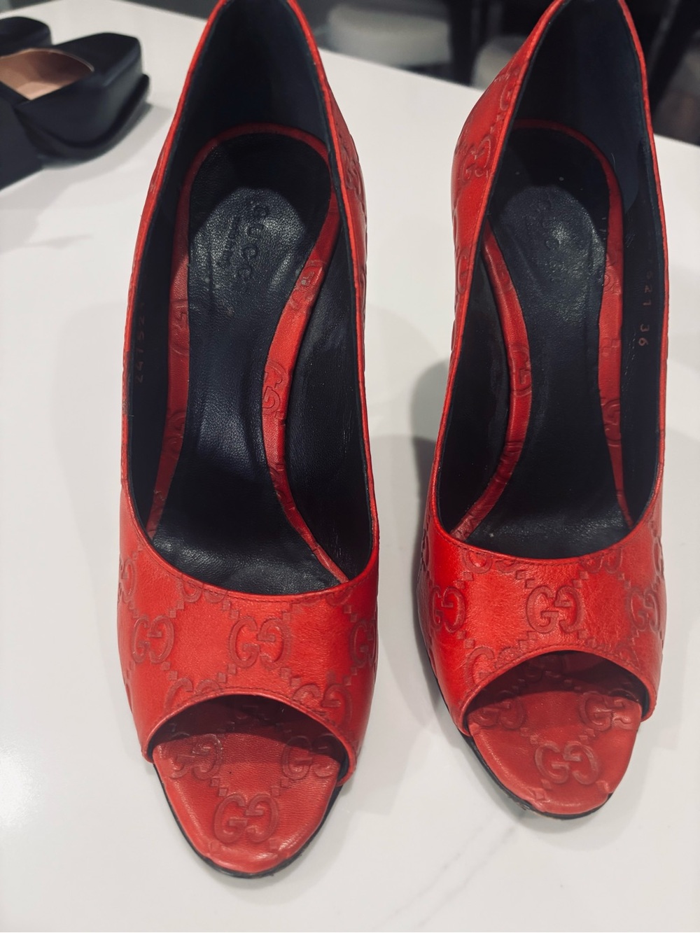 Gucci Red Embossed GG Peep-Toe Leather Heels